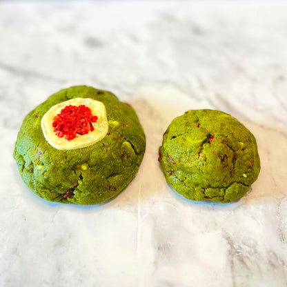 Jade Kiss Cookies: petit (3oz) next to regular (5.3oz) for a size comparison on  a marble countertop.